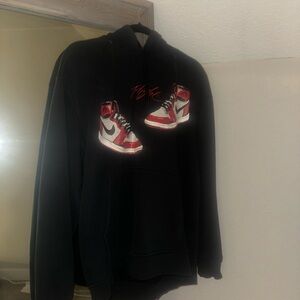 Jordan Black Hoodie with Red and White Sneaker Graphic